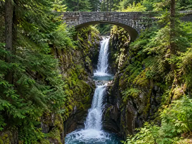 Christine Falls beneath its arched stone road bridge
